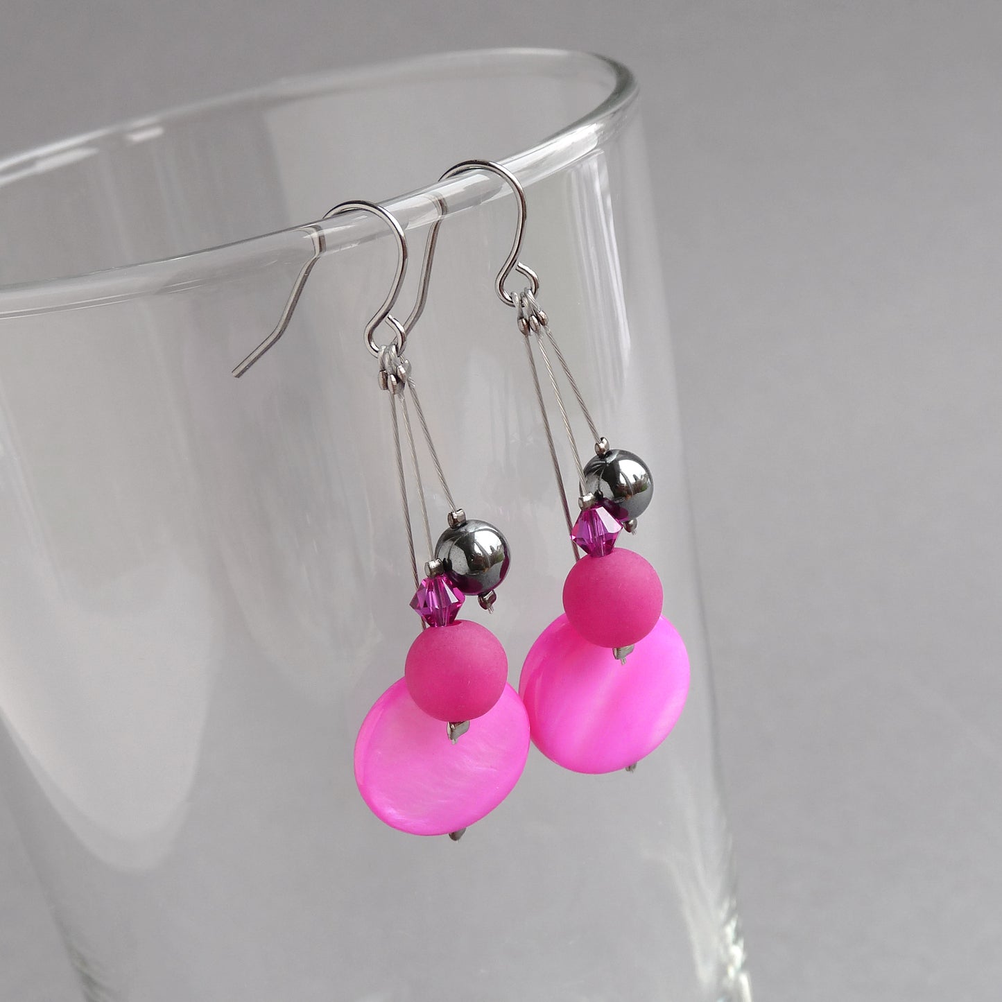 Dangly bright pink earrings