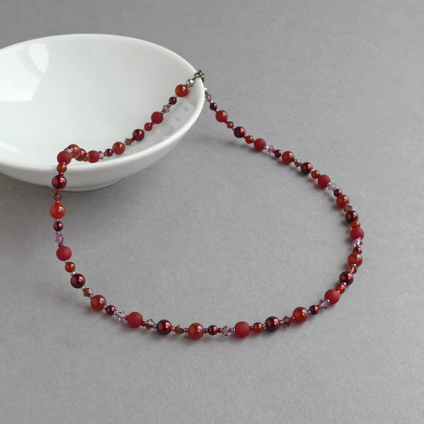 Dark red pearl necklace
