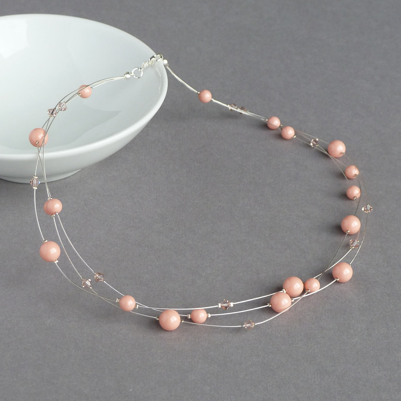 Pink coral floating pearl necklace