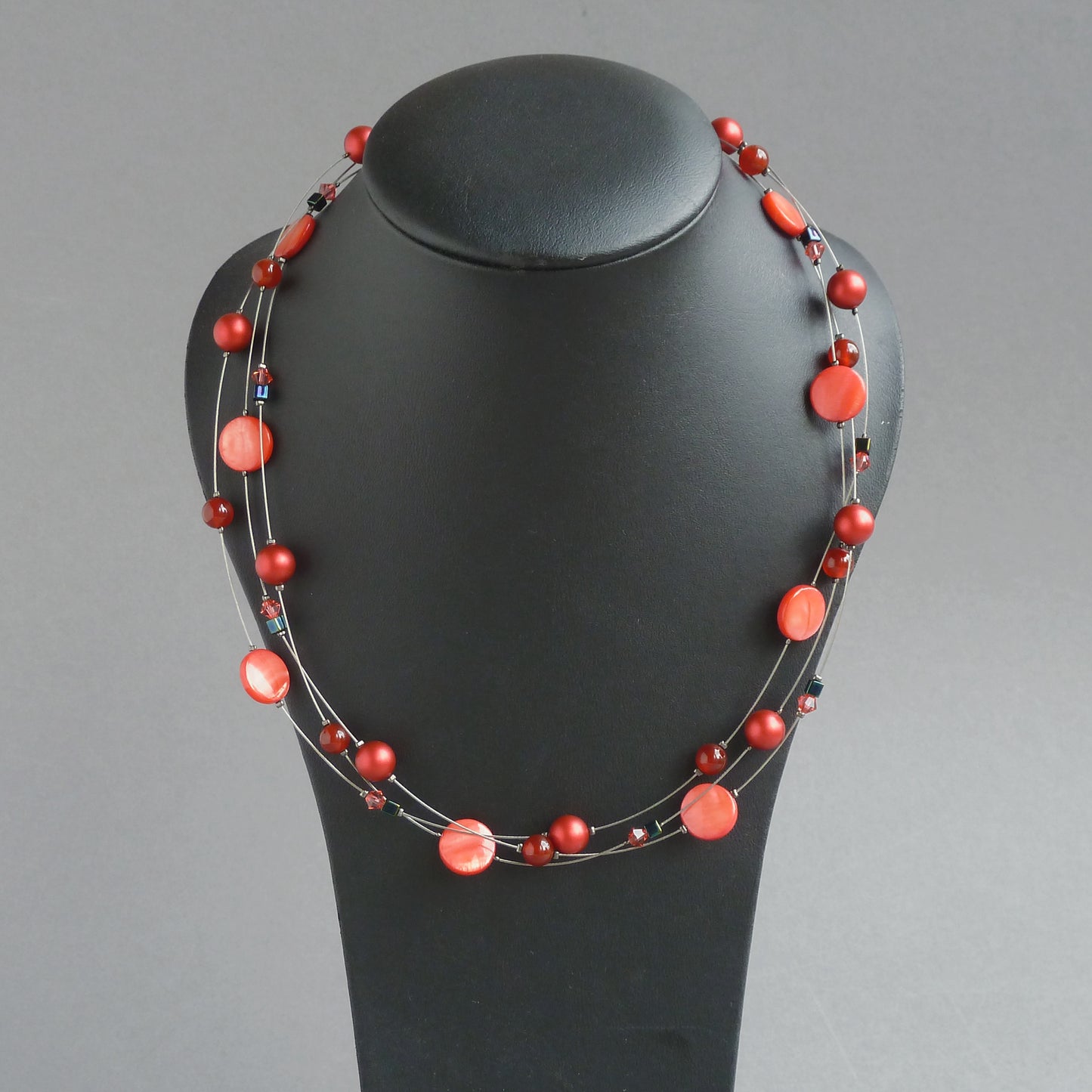 Red three strand necklace