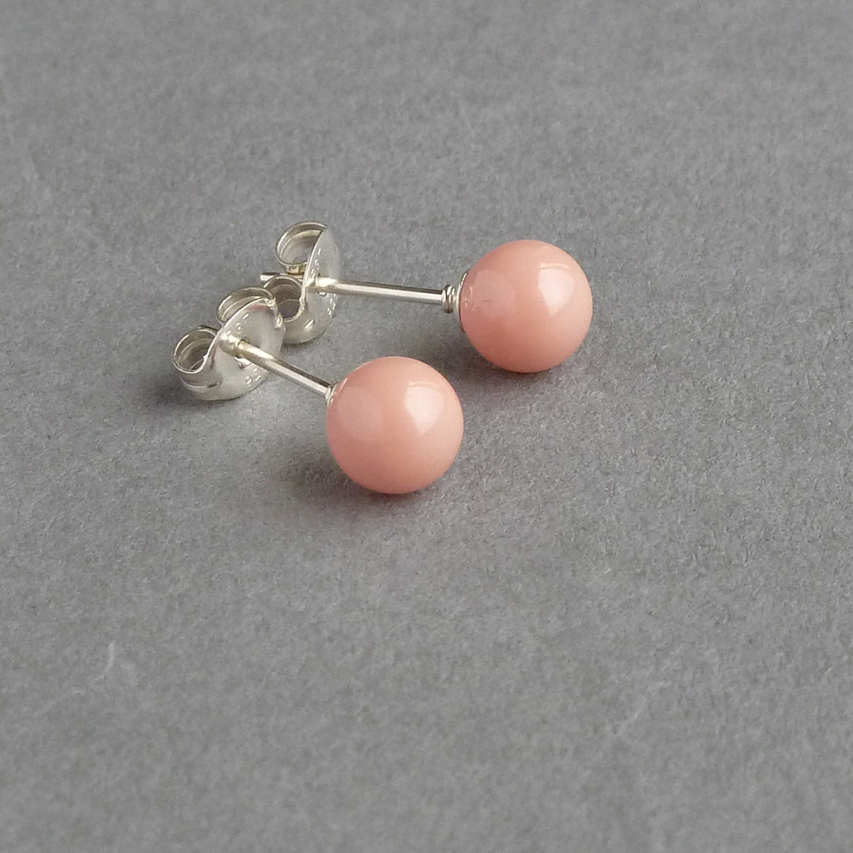 Round 6mm coral pink studs