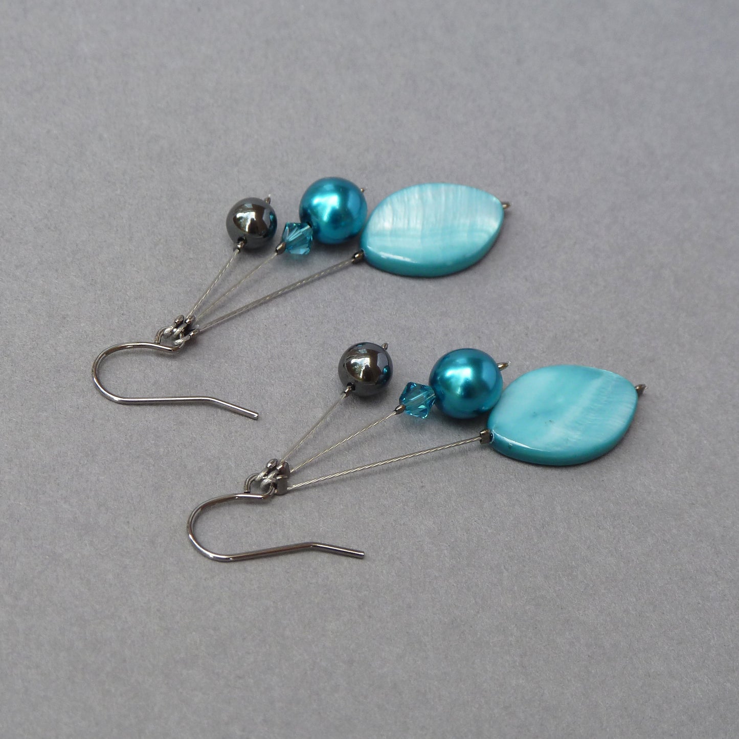 Dangly teal earrings