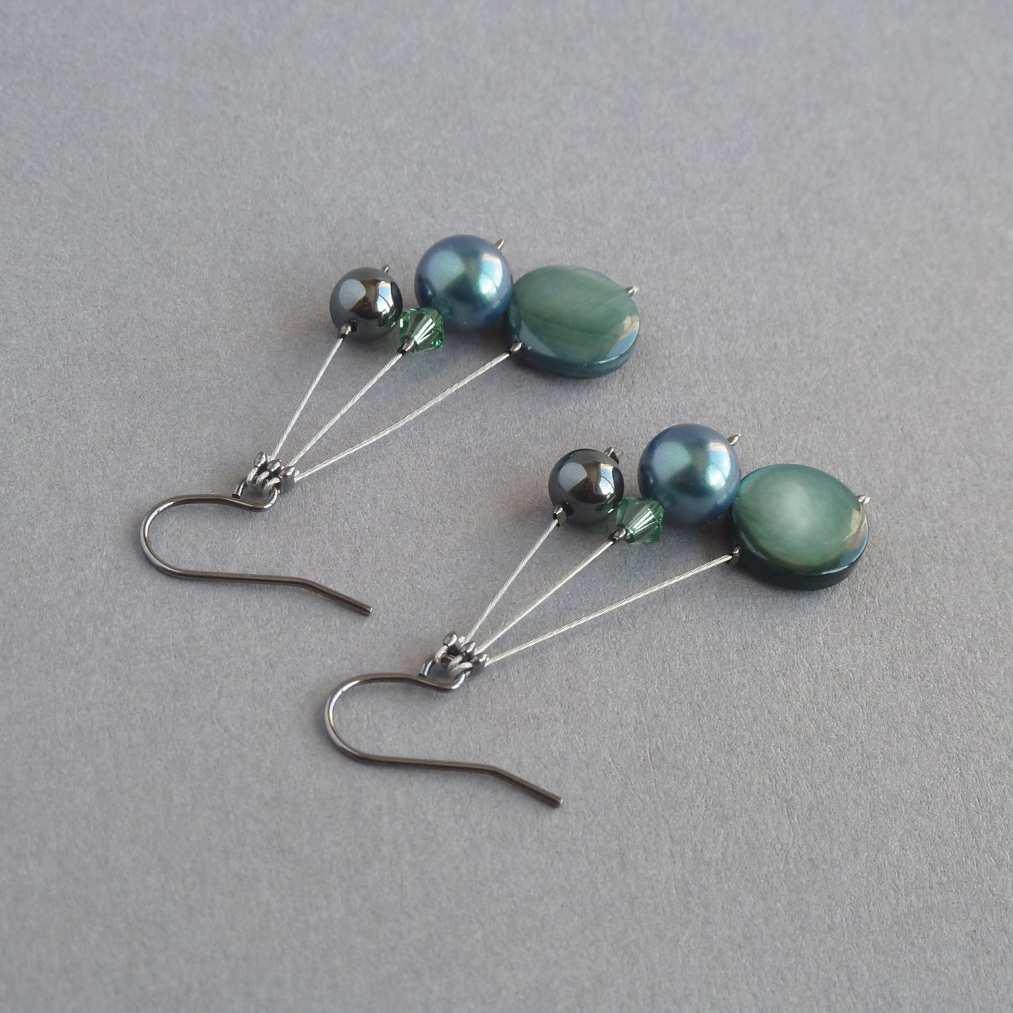 Dark green three strand drop earrings