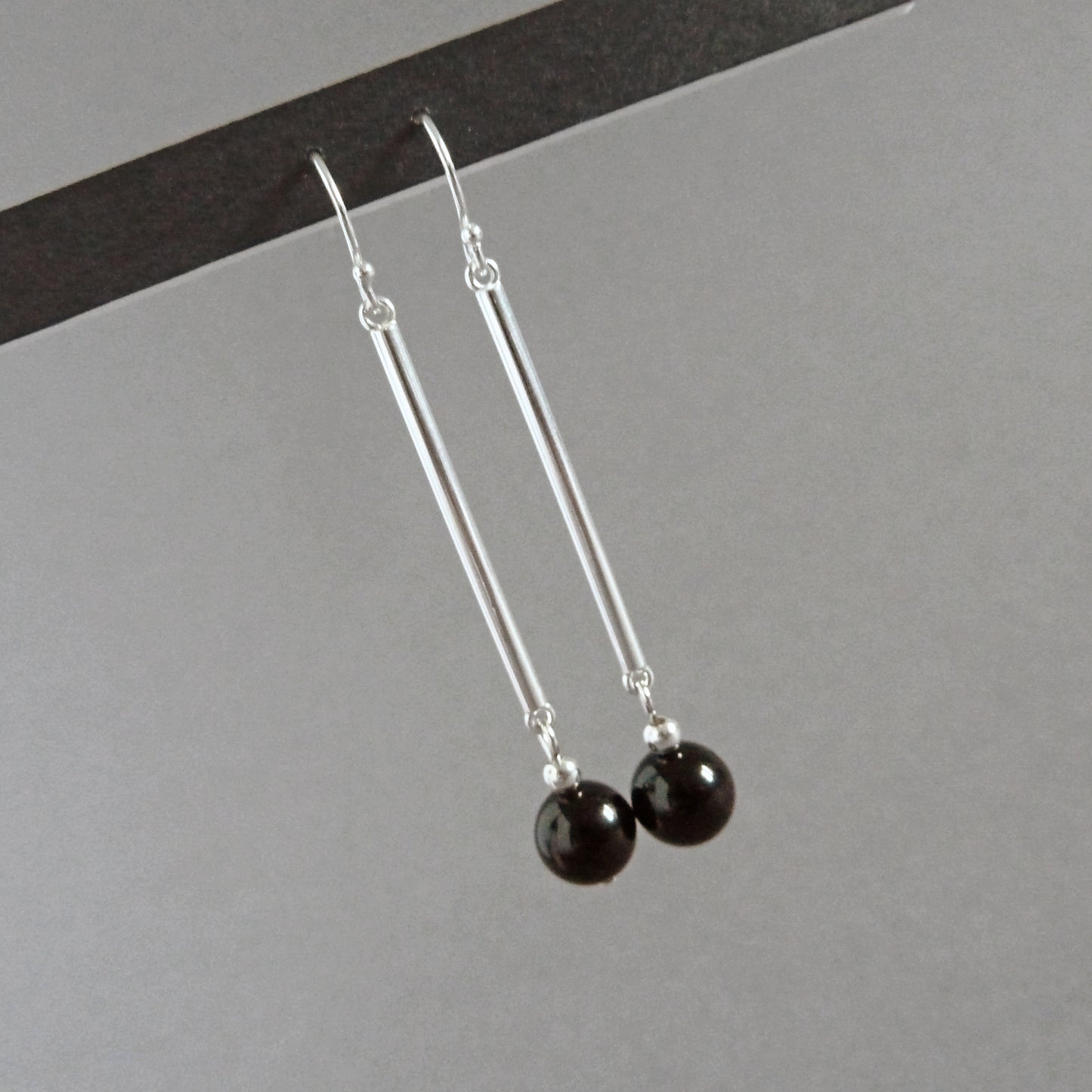 Long black dangle earrings