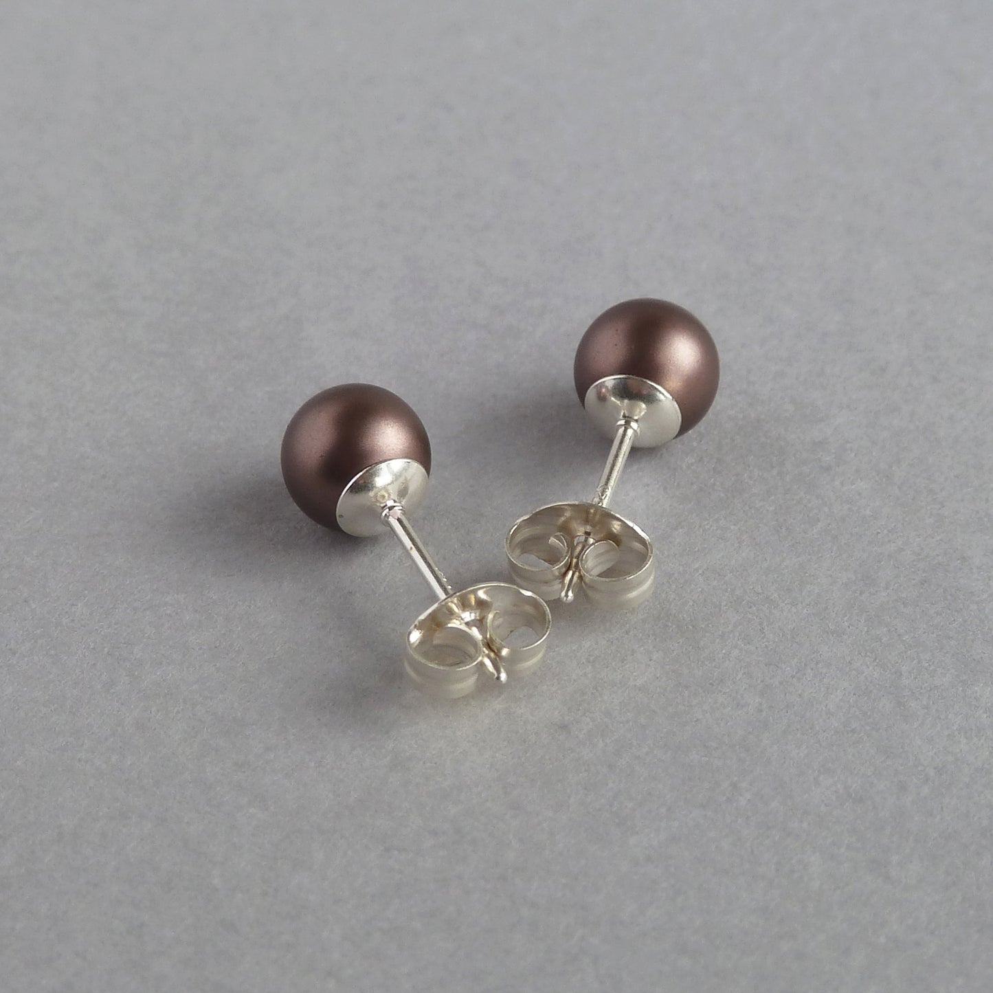 Small dark brown pearl studs