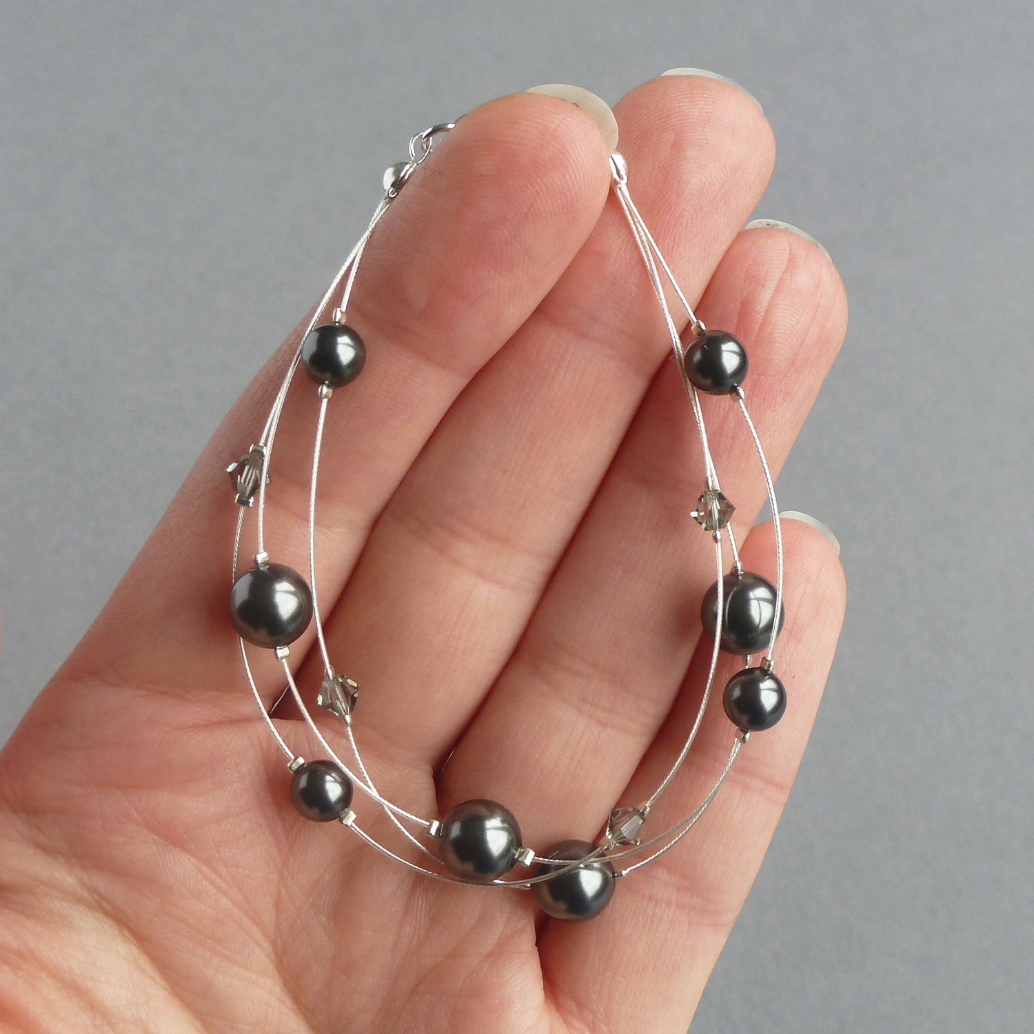 Black pearl three strand bracelet
