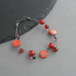 Bright red three strand bracelet