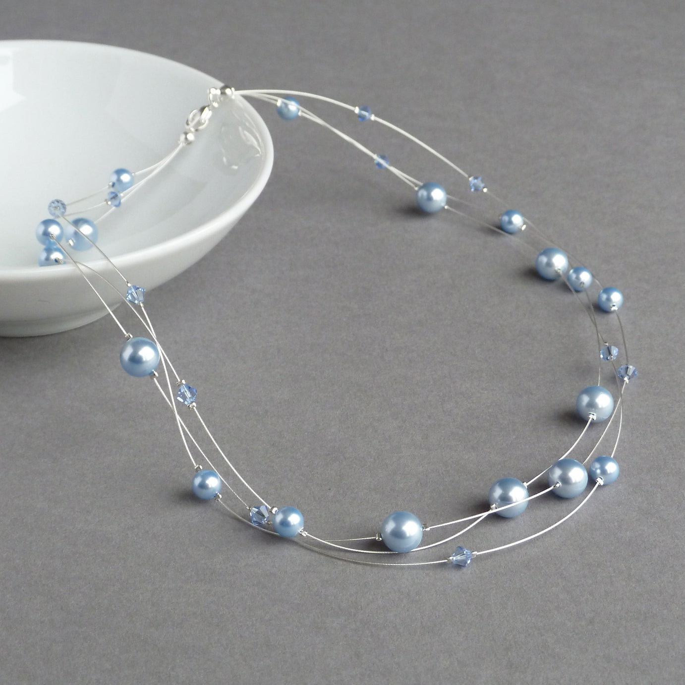 Dainty light blue floating pearl necklace