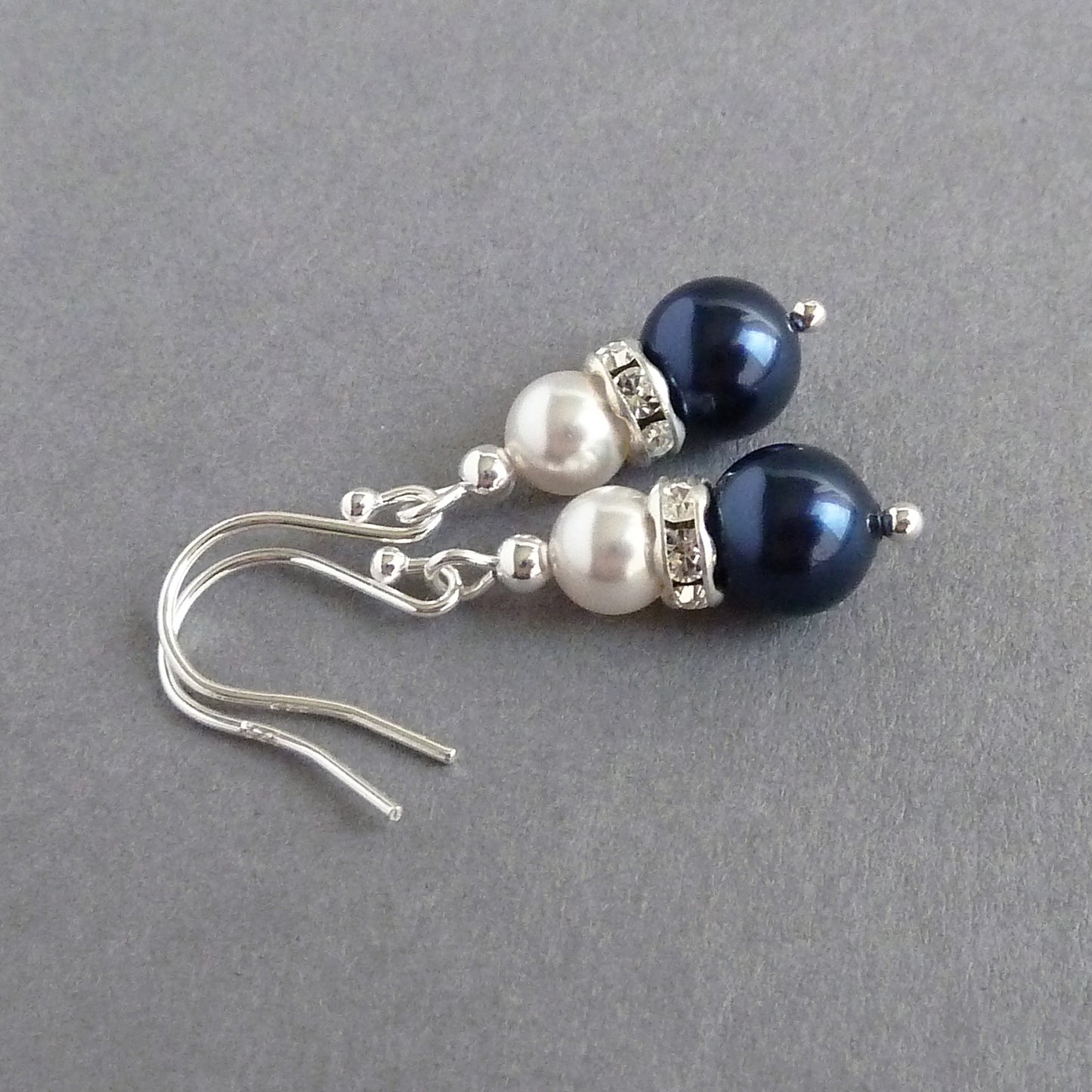 Dark blue and white pearl drop earrings