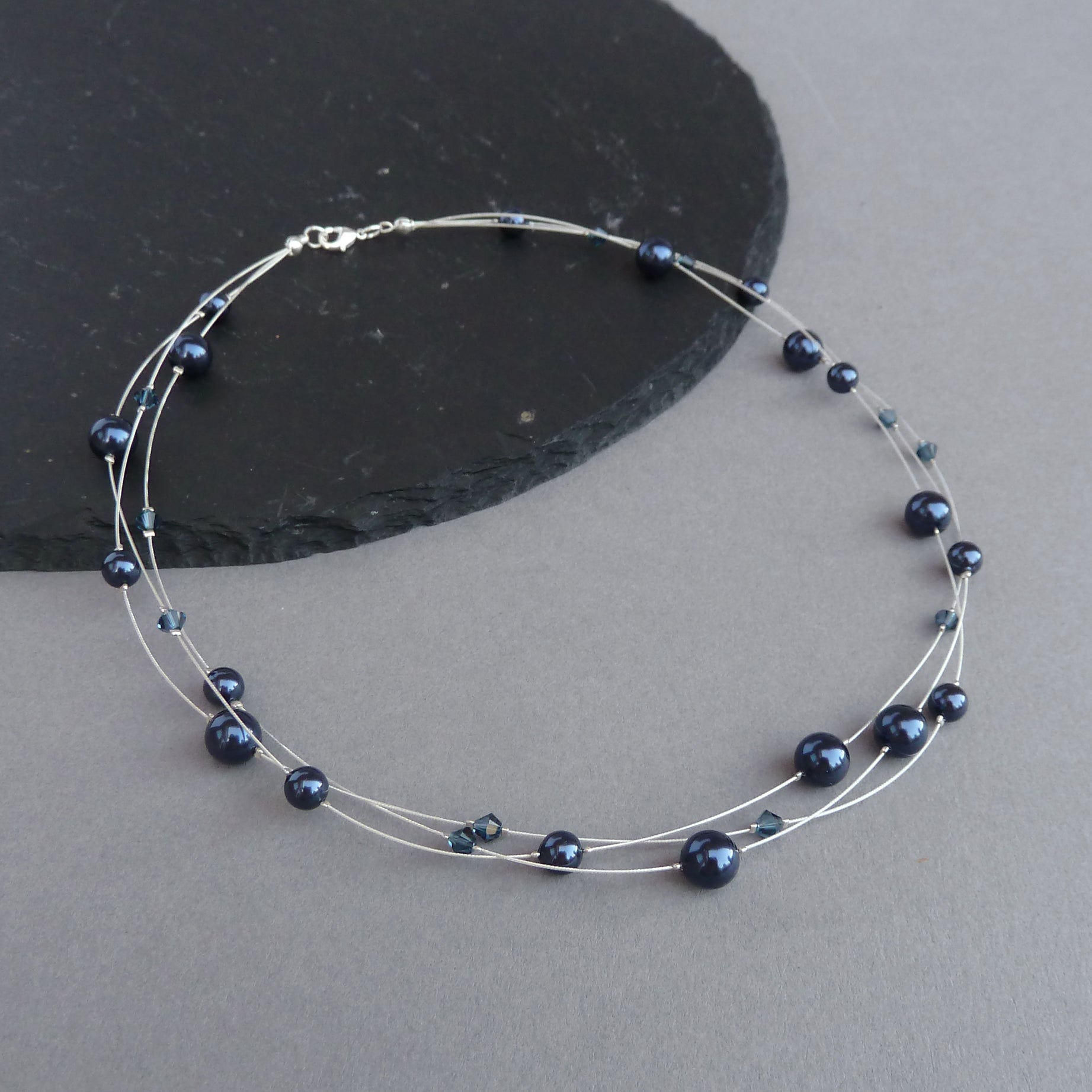 Navy blue hot sale floating pearls