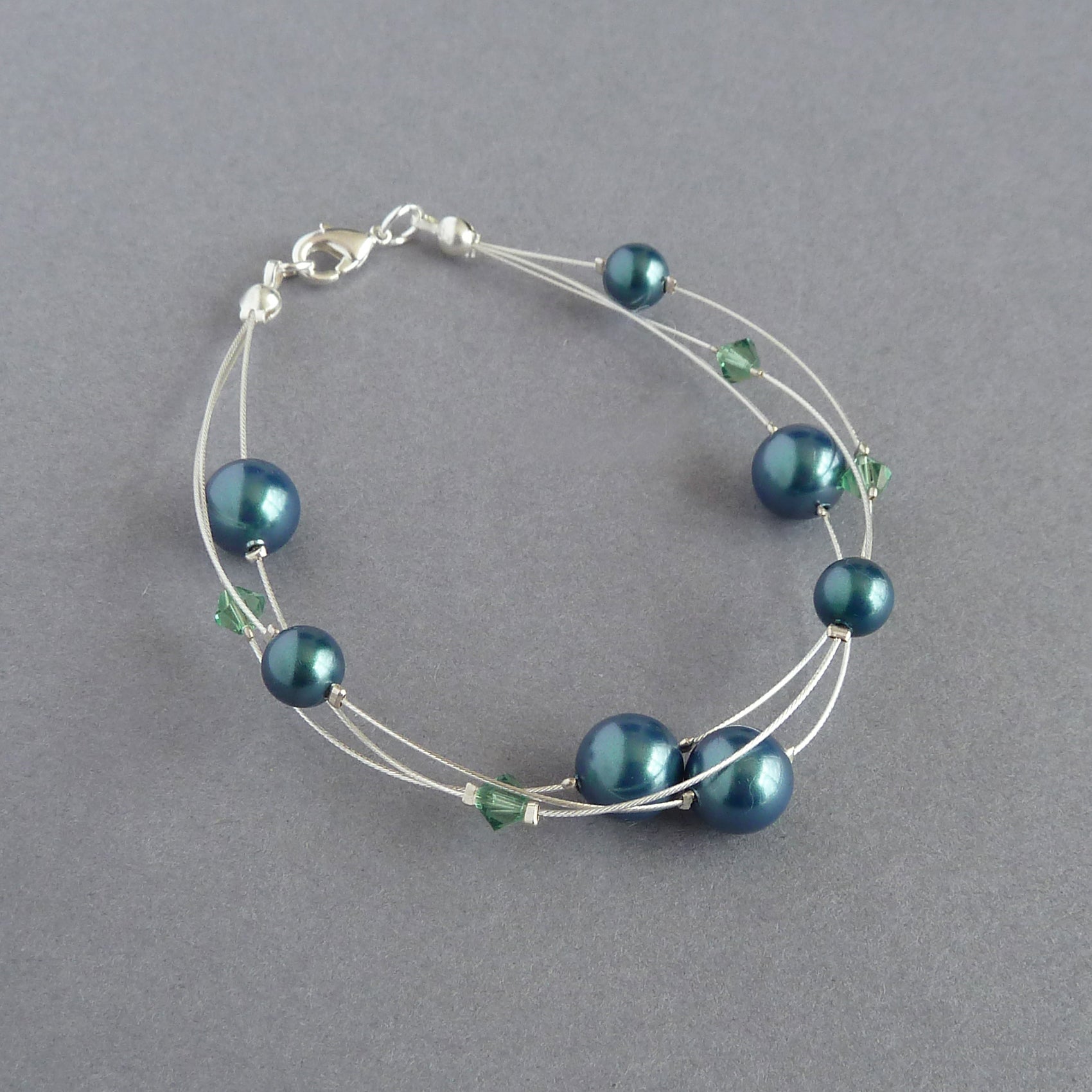 Dark green floating pearl bracelet for women