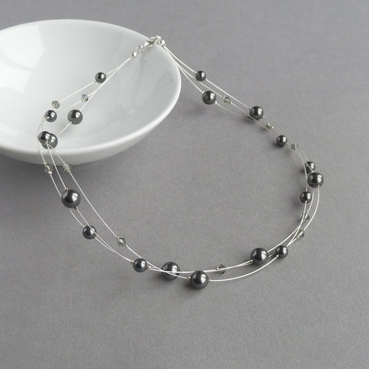Dark grey floating pearl necklace
