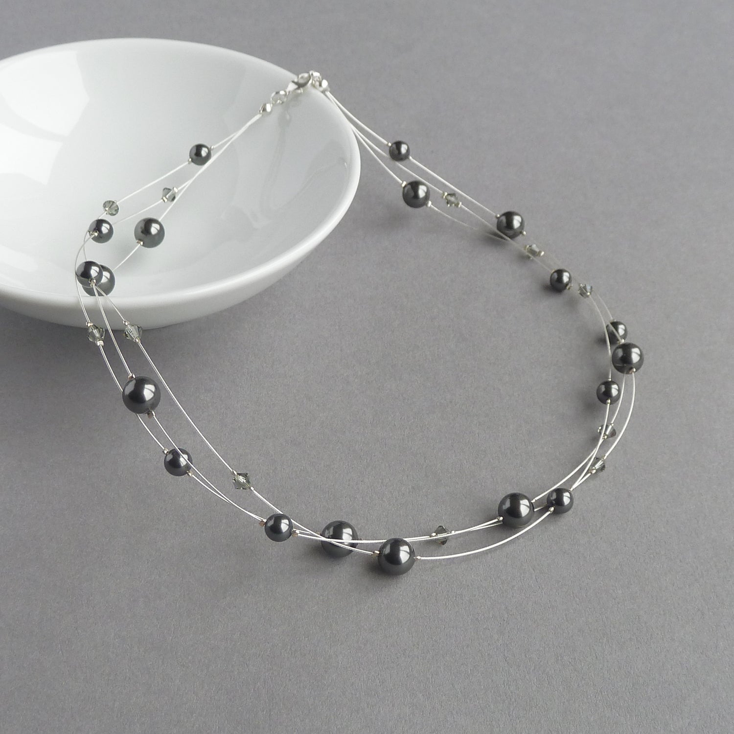 Dark grey floating pearl necklace