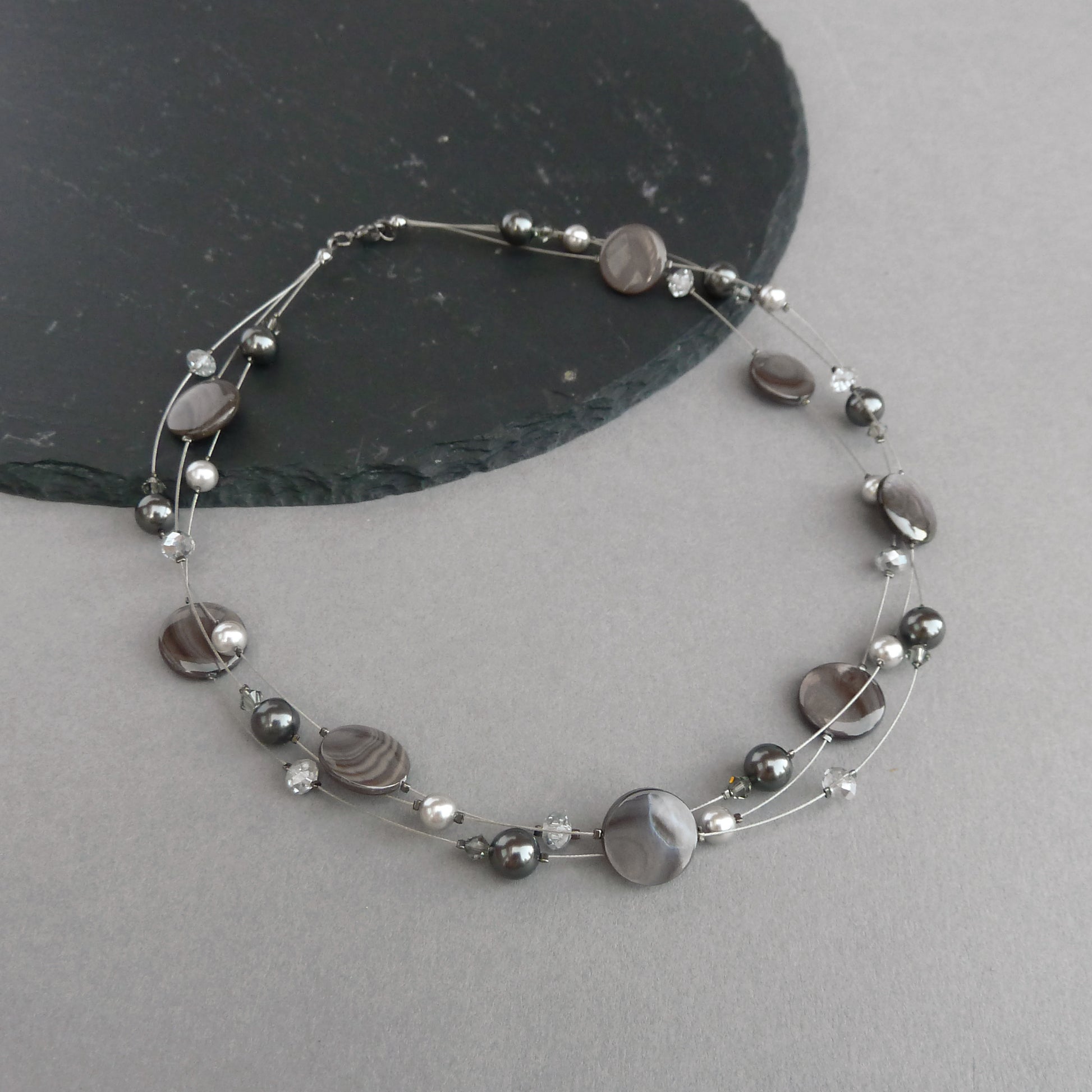 Dark grey three strand necklace