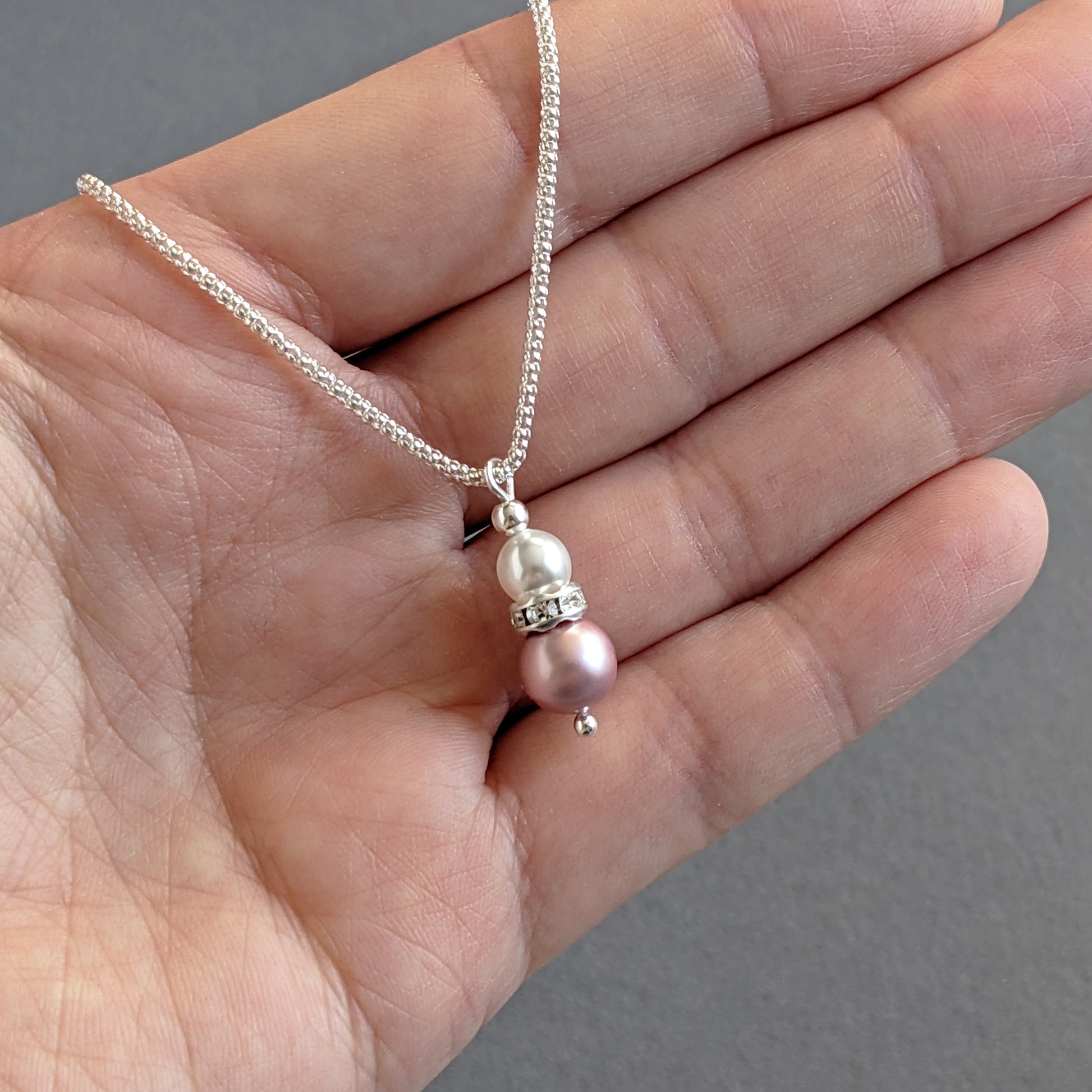Dusty pink pearl pendant necklaces
