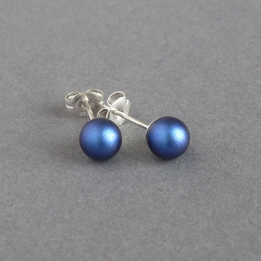 Iridescent dark blue pearl stud earrings