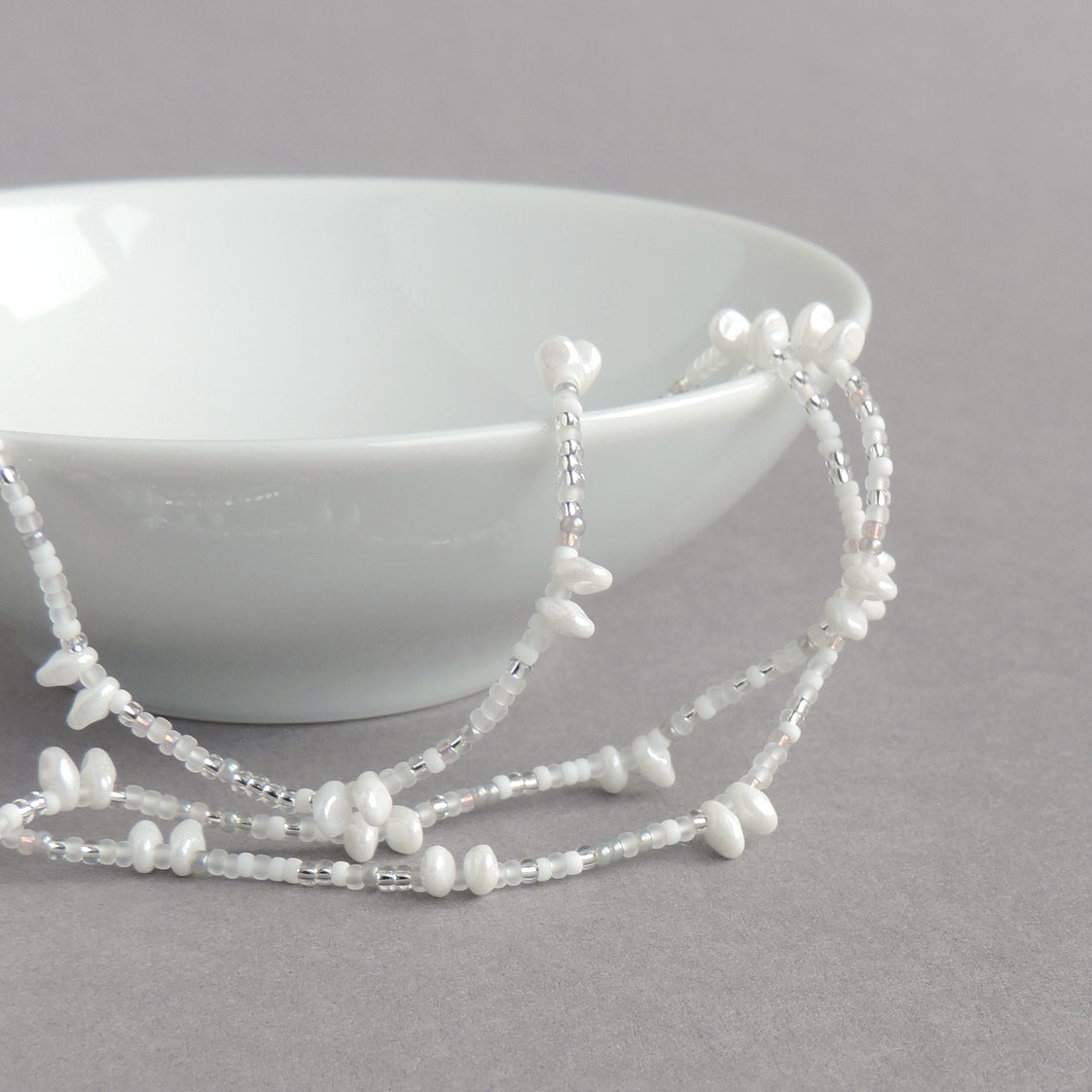 Long beaded white necklace