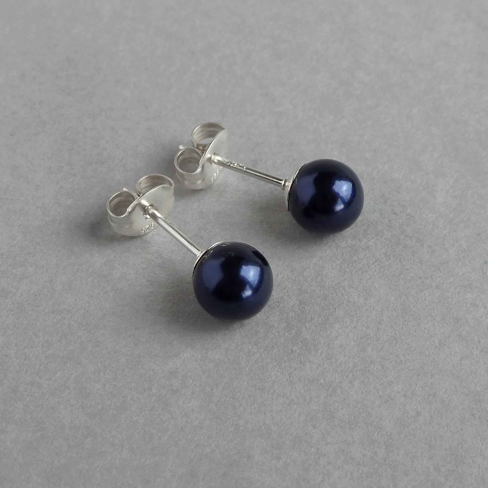 Navy blue pearl stud earrings