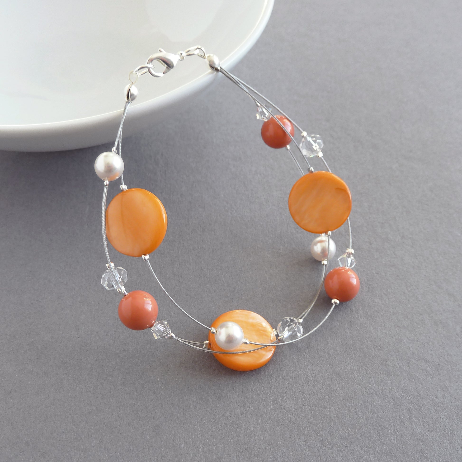 Orange multi strand bracelet