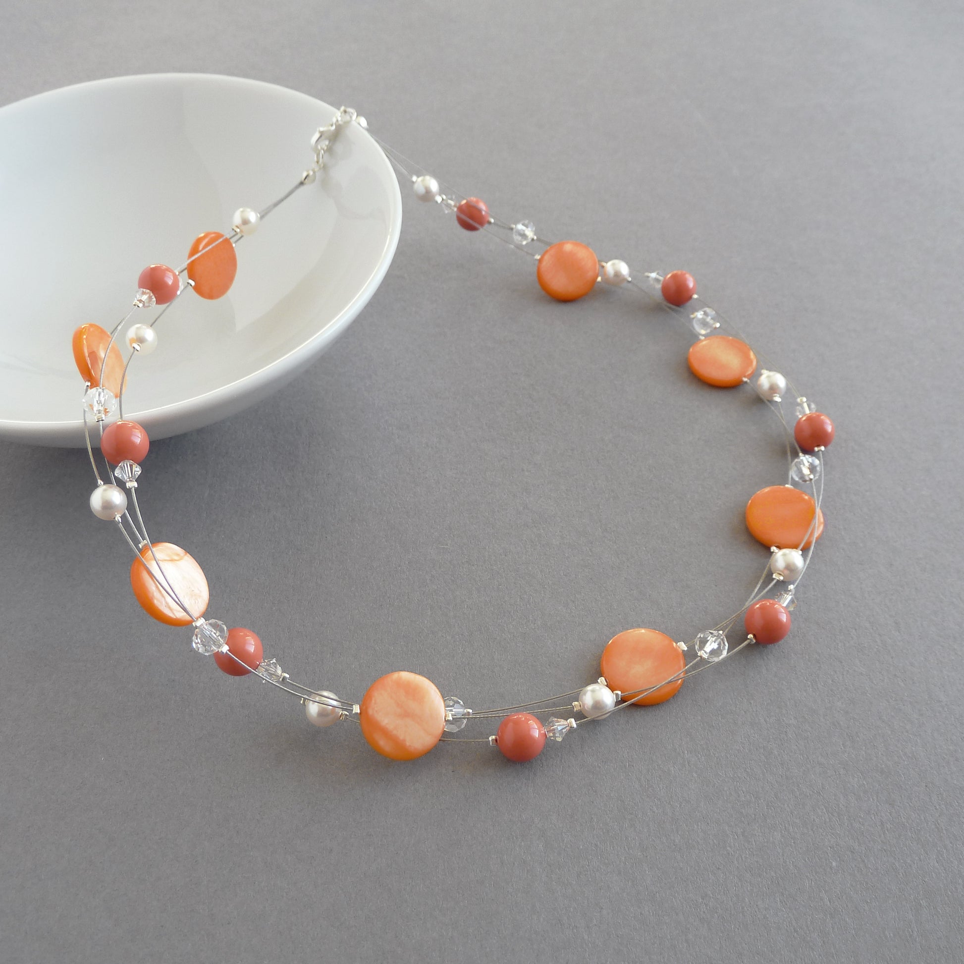 Orange multi strand necklace