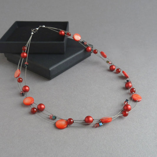 Red multi-strand necklace