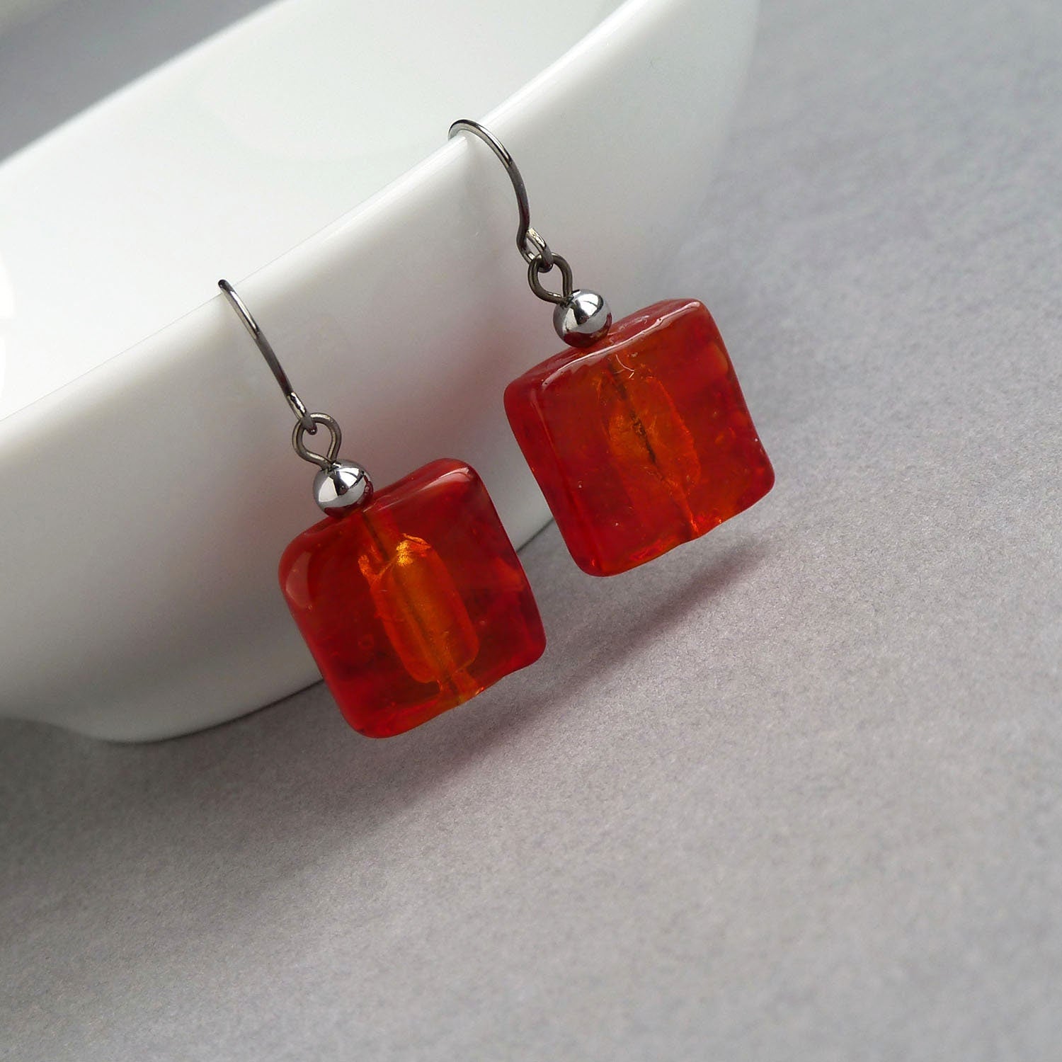 Red dangle earrings