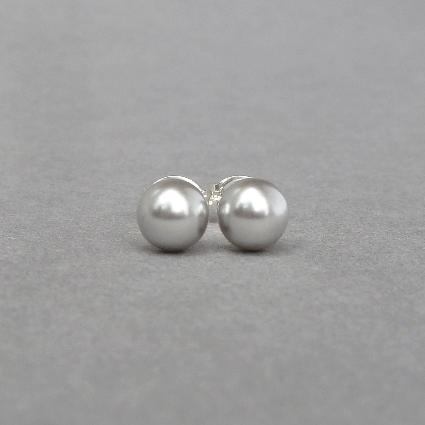 Round light grey pearl stud earrings