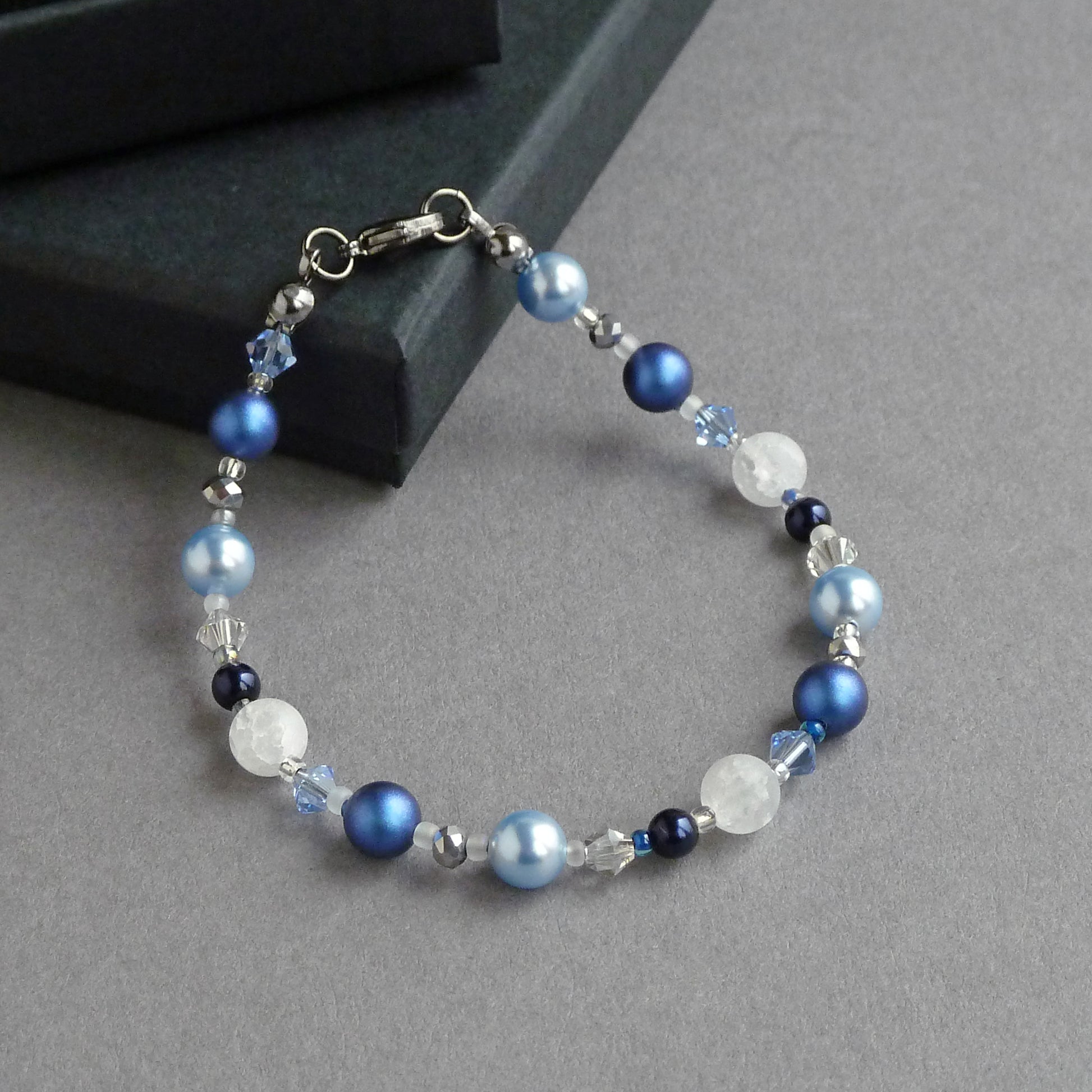 Royal blue single strand bracelet made with glass pearls, crystals, quartz and glass beads.
