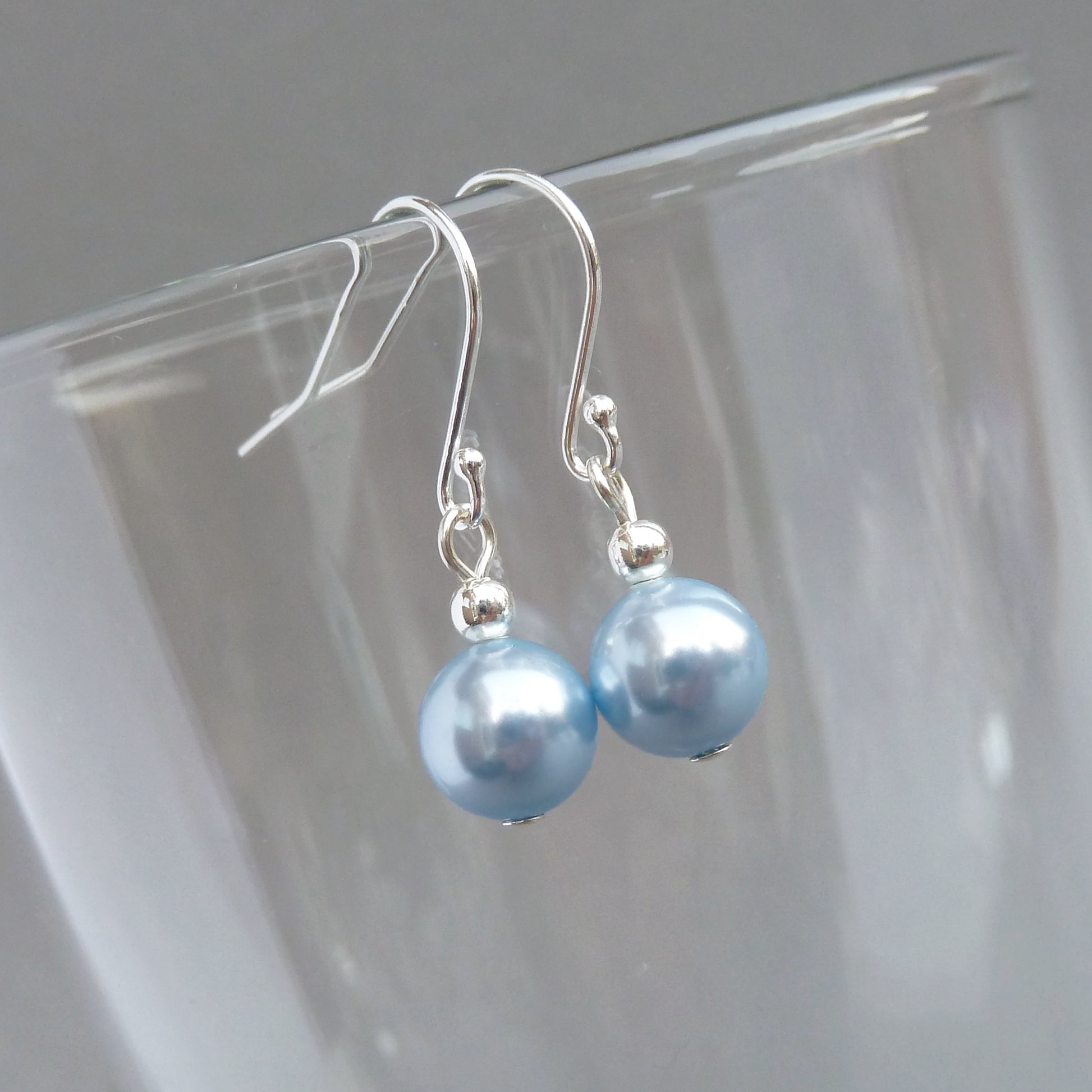 Simple light blue pearl drop earrings