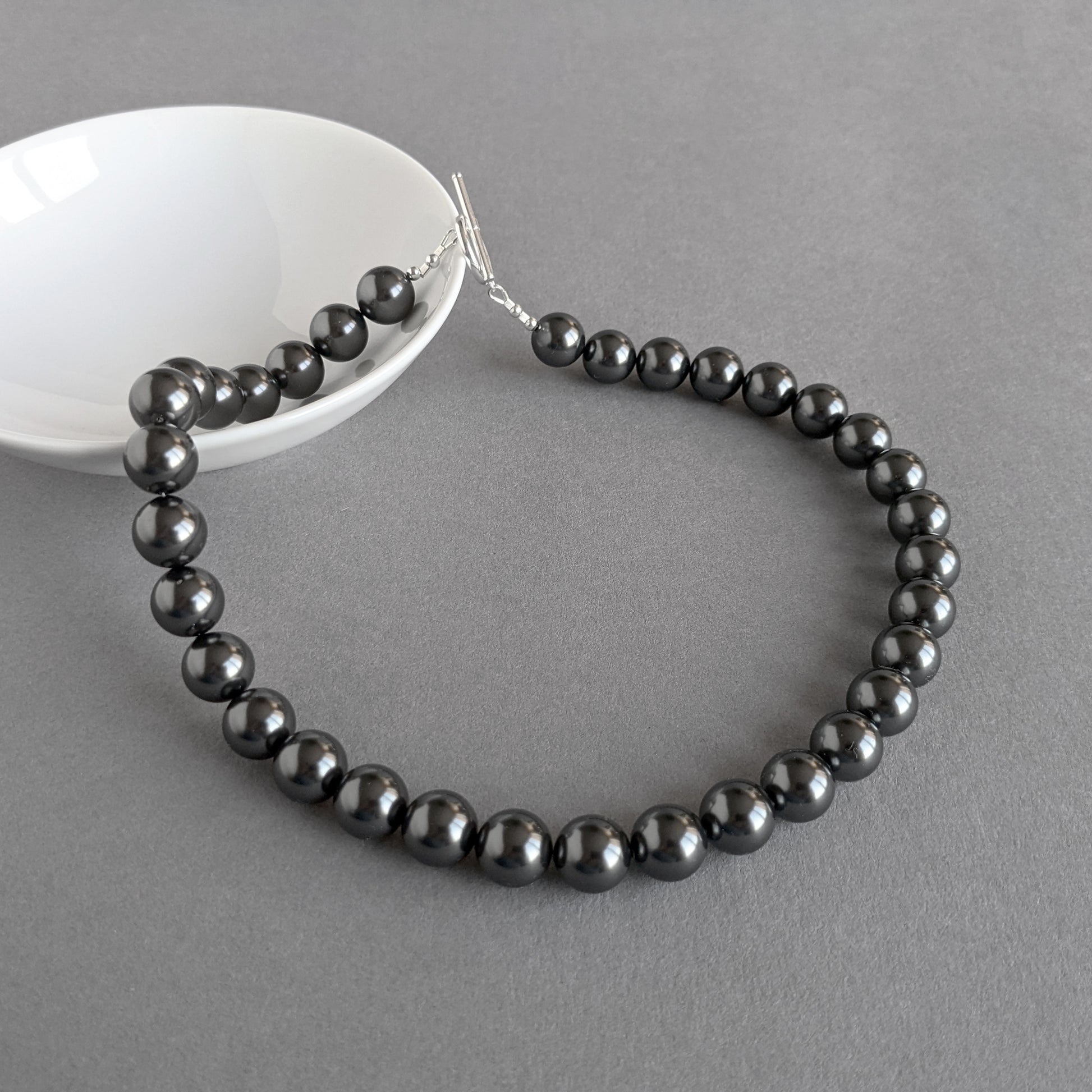 Single strand black pearl necklace