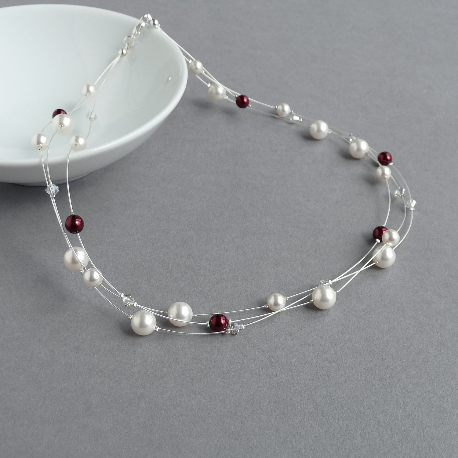 White and burgundy three strand necklace