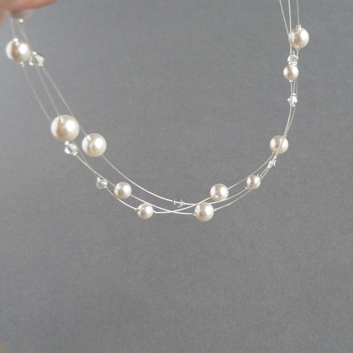 white pearl multi strand necklaces