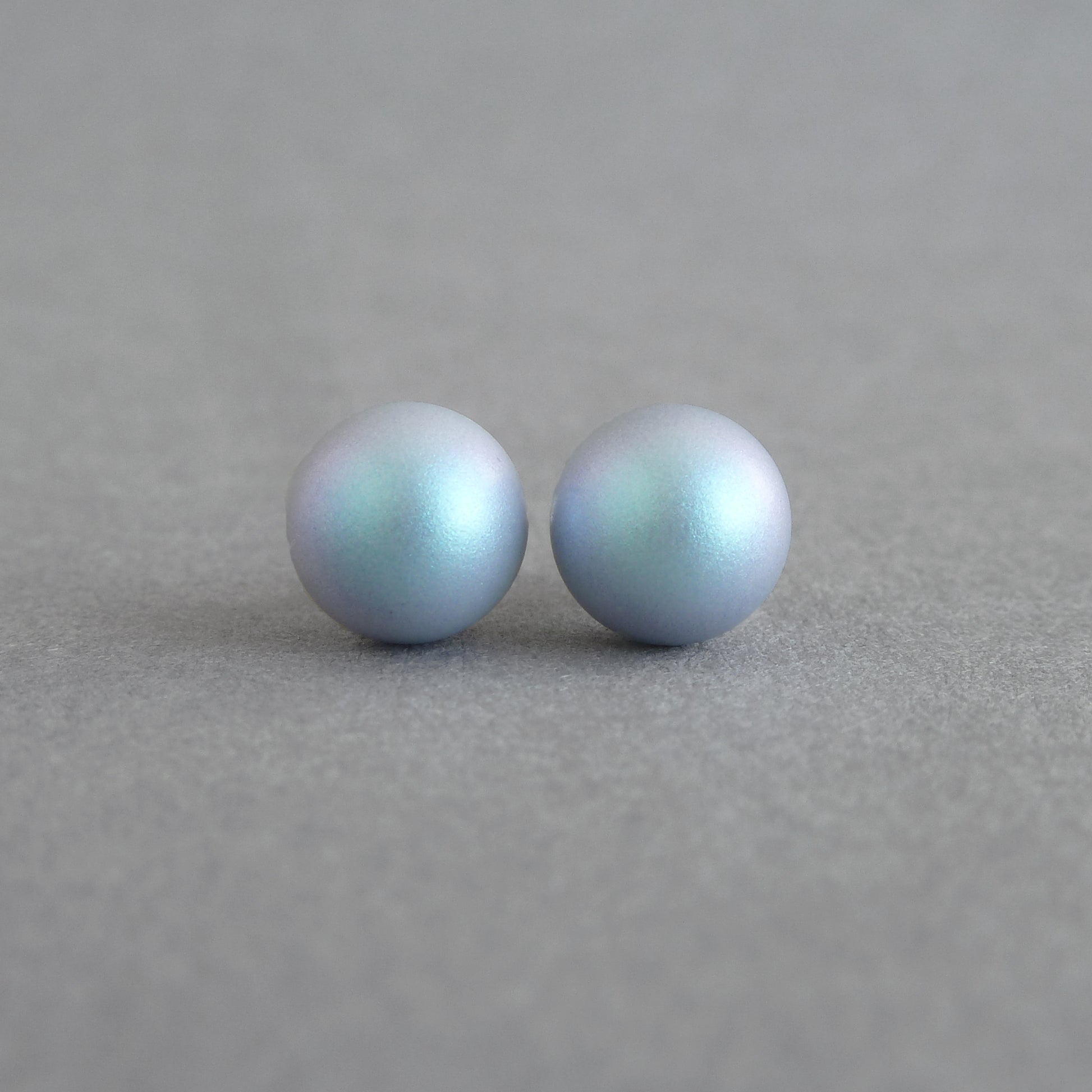 8mm iridescent light blue stud earrings