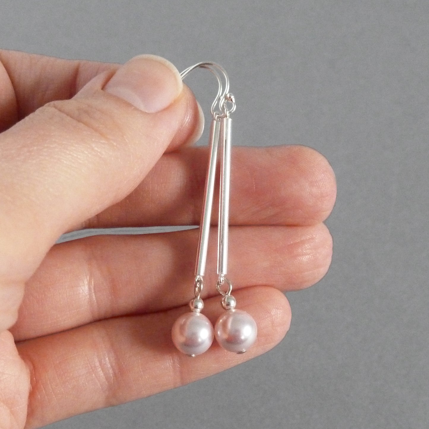 Long baby pink drop earrings