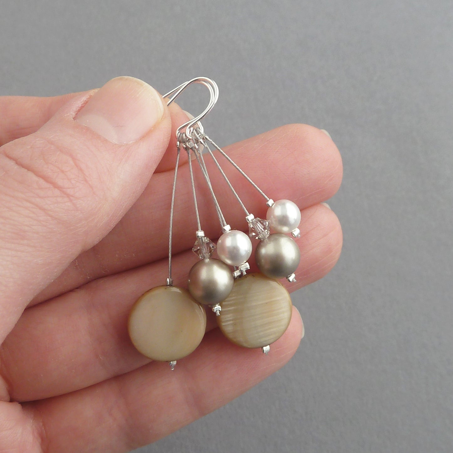 Beige dangle earrings