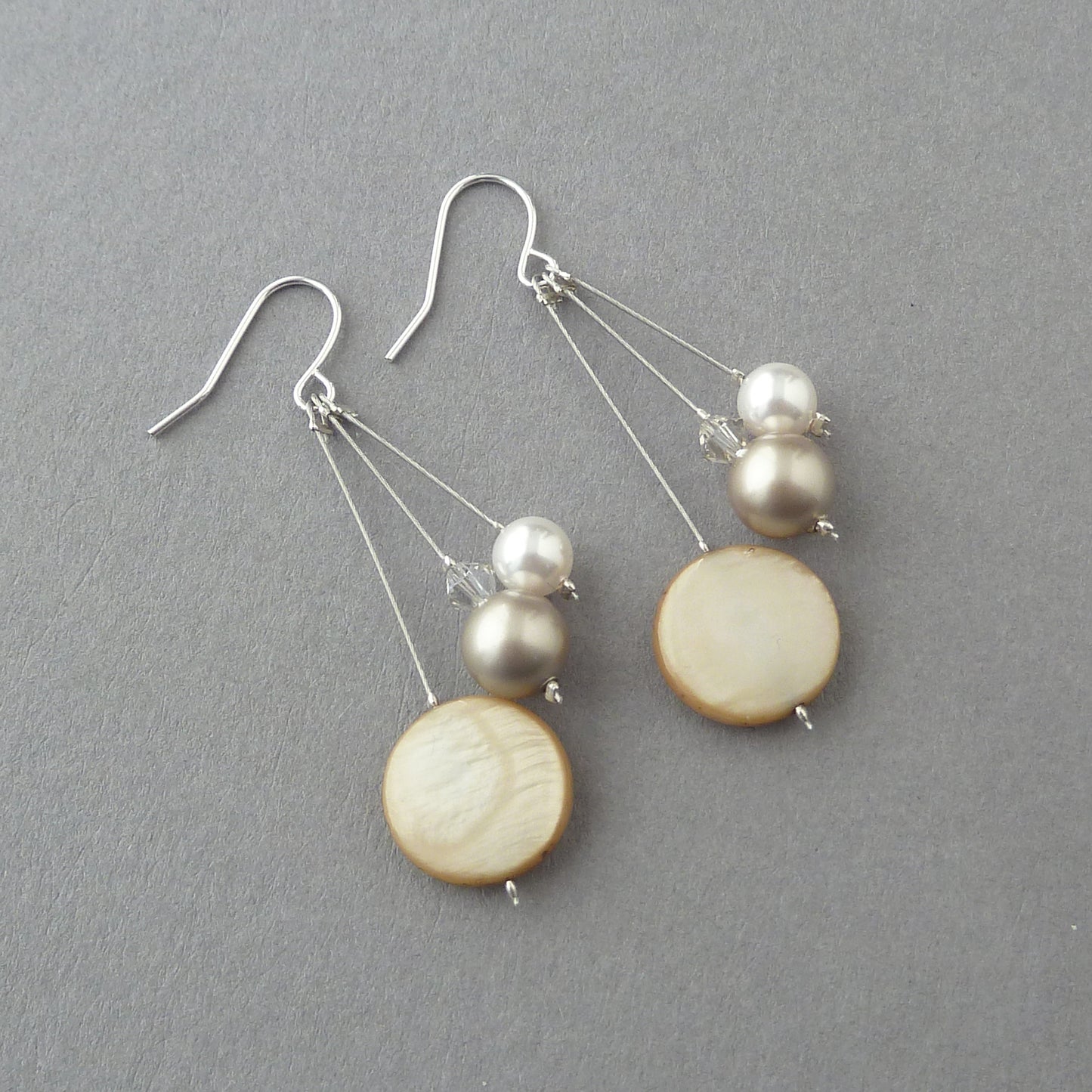 Beige three strand earrings