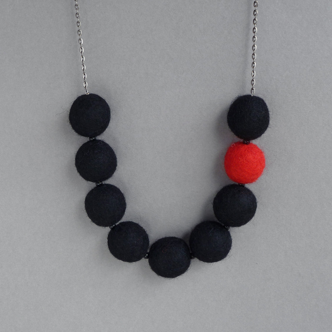 Black and red felt necklace