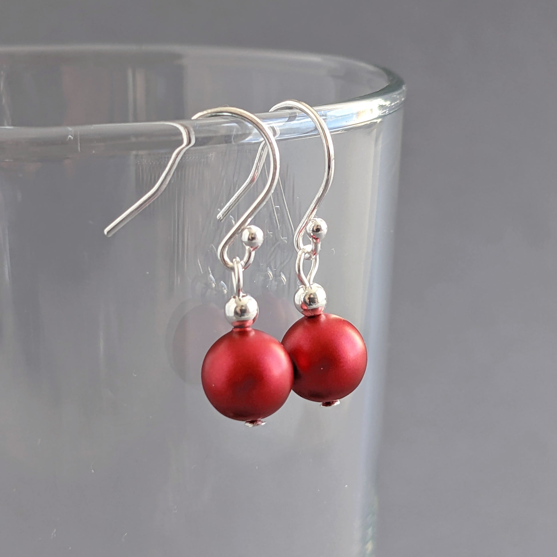 Bright red pearl drop earrings