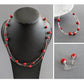 Bright red pearl jewellery set by Anna King