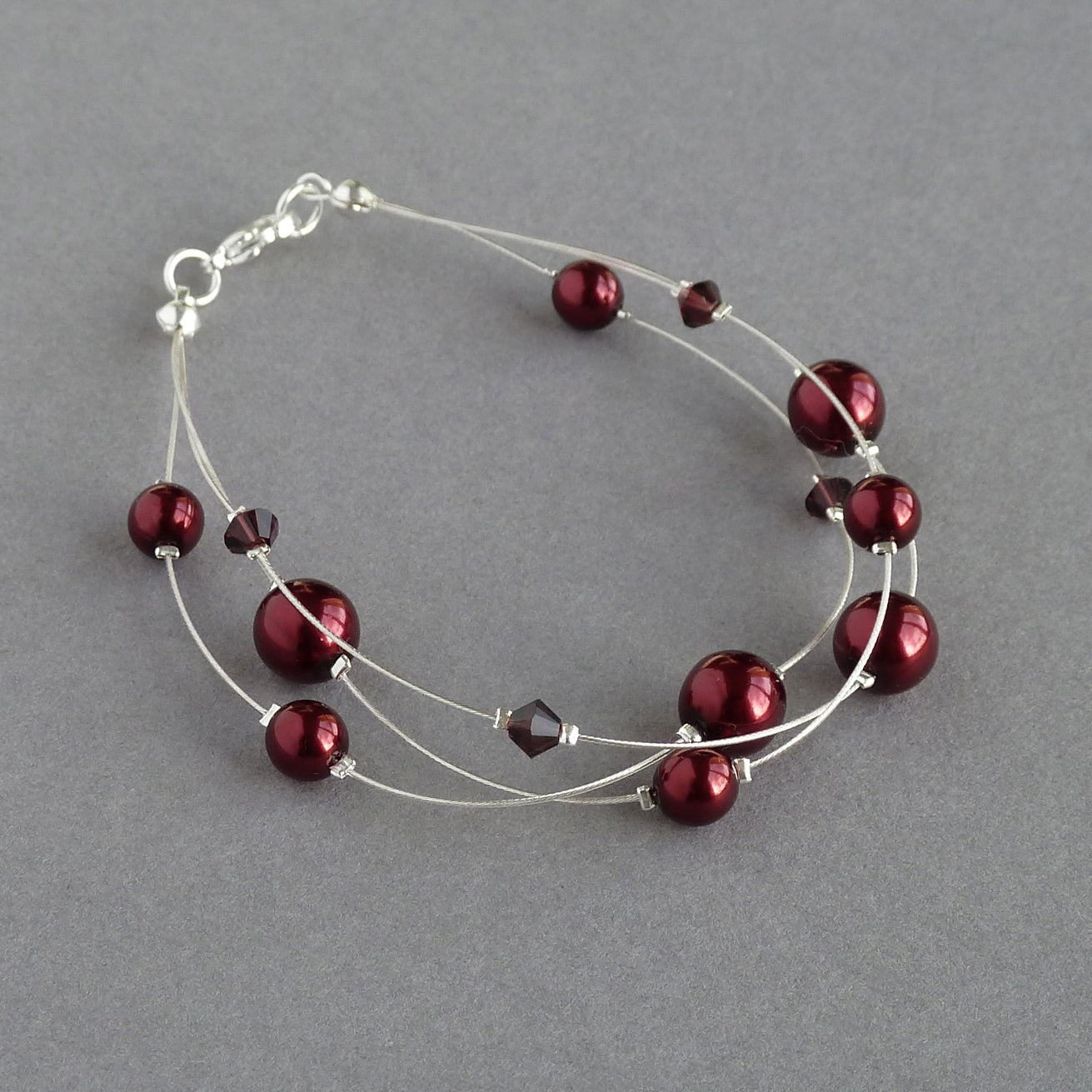 Burgundy floating pearl bracelet