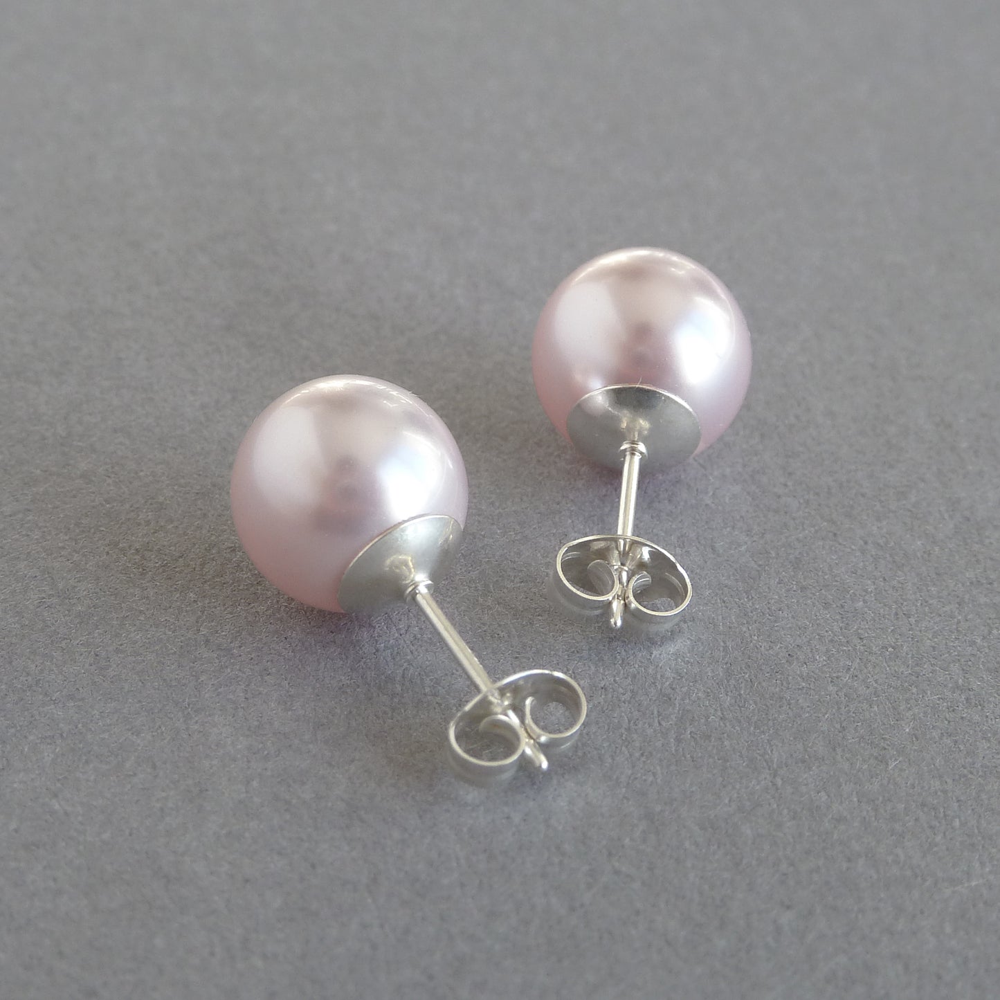 Chunky light pink studs