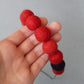 Chunky red felt ball necklaces