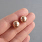 Chunky rose gold pearl studs