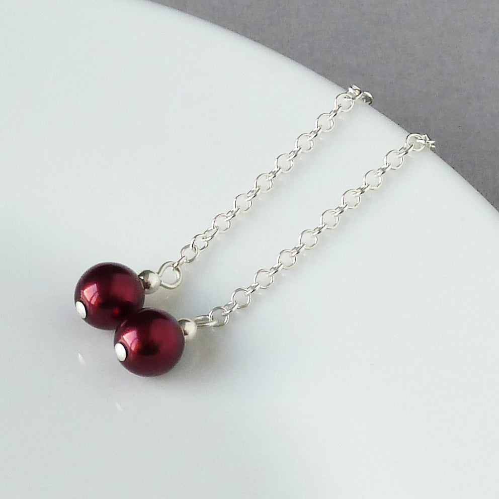 Dainty burgundy pearl earrings