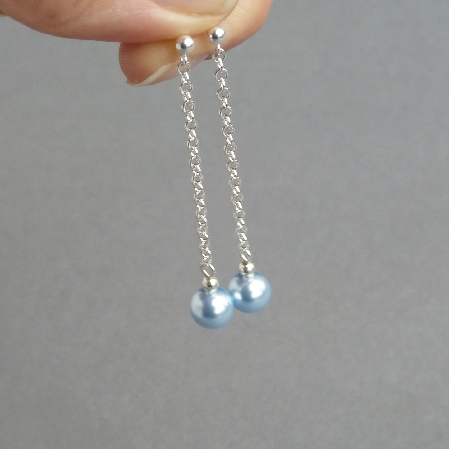 Dainty light blue pearl earrings