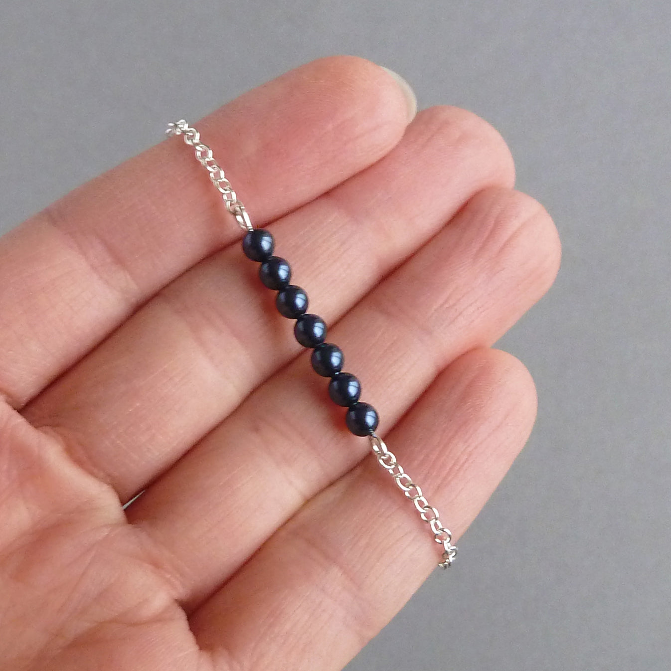 Dainty navy blue pearl bracelet