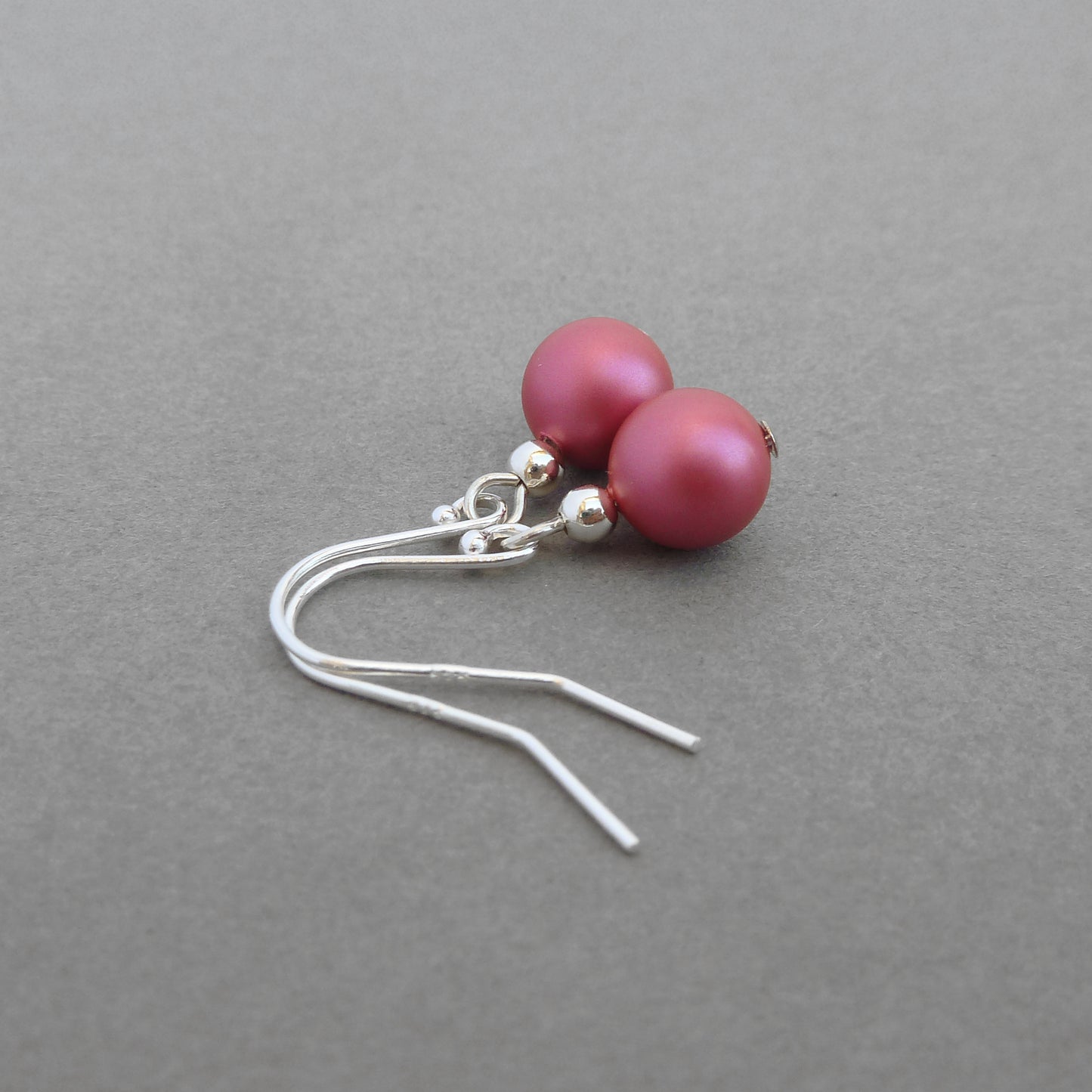 Dangly dark pink earrings