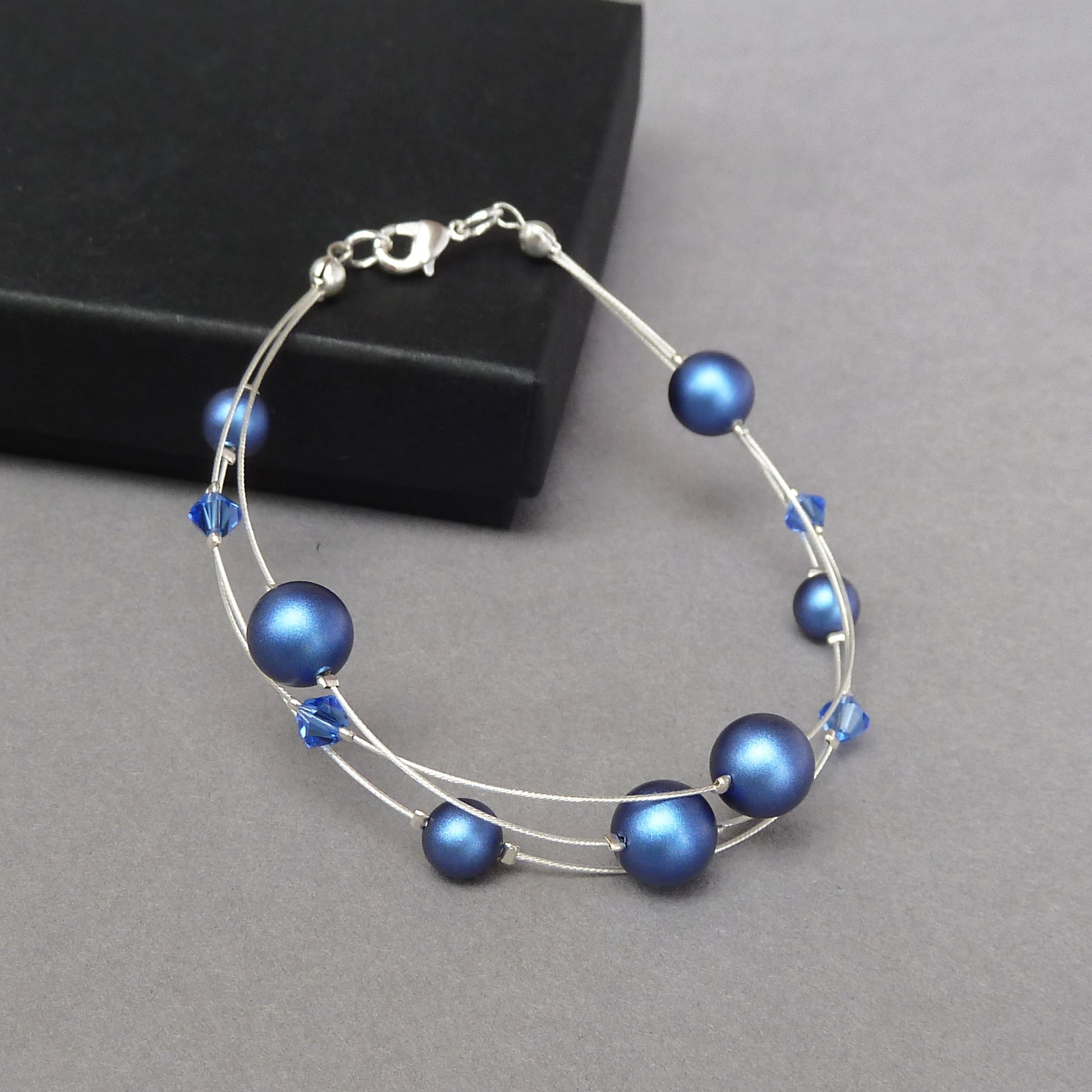 Dark blue floating pearl bracelet