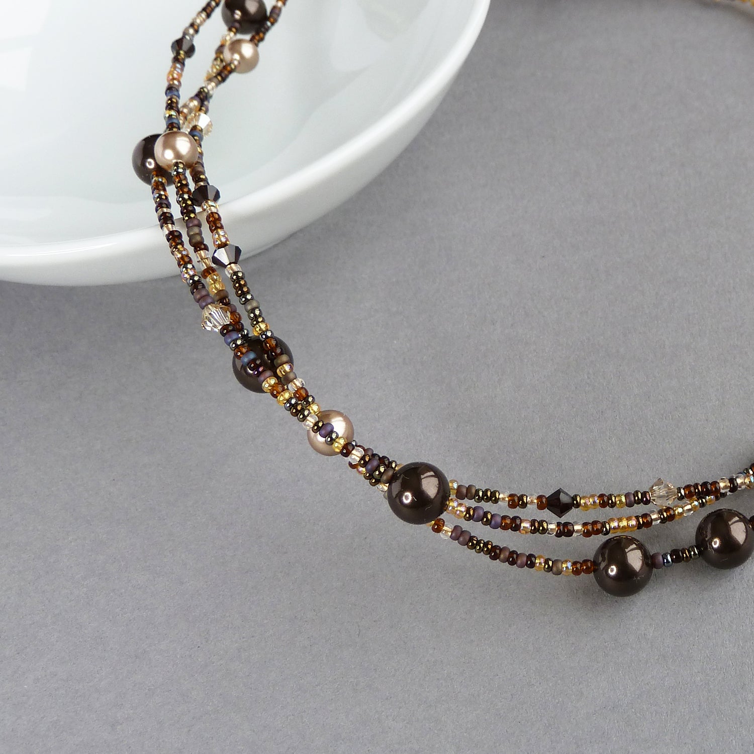Dark brown multi-strand pearl necklace