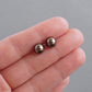 Dark brown pearl studs